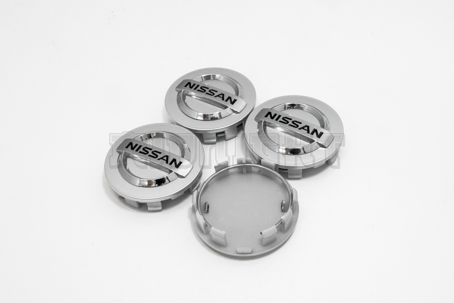 Set Of Four Nissan Silver Center Hub Caps